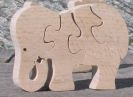Puzzle bois 4 pièces éléphant mangeant Hetre
